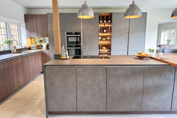 Warm, Sleek, Kitchen with Matt Stone & Wood Effect Cabinets