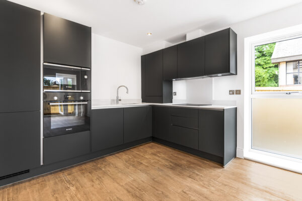 Modern Charcoal L-Shaped Contract Kitchen Installation