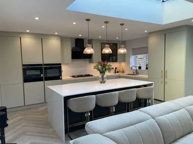 Overview of a modern open-plan kitchen with island and seating