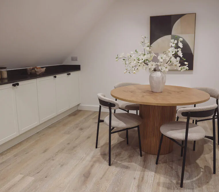 white kitchen dining area